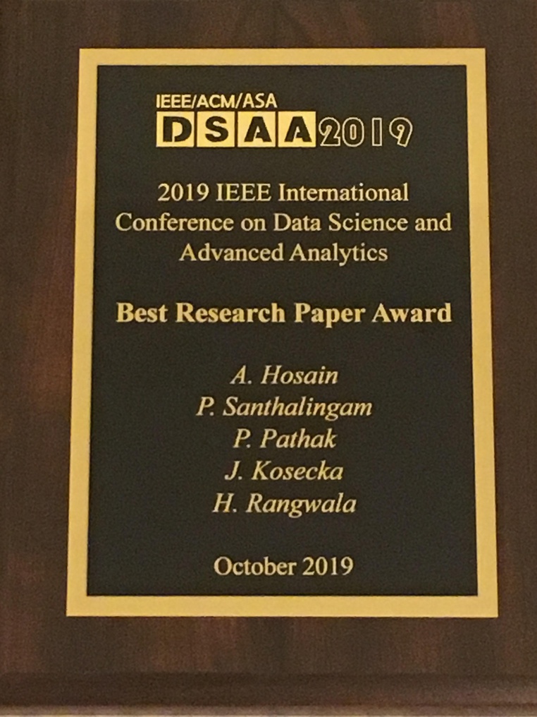 Post Image: Students Al-Amin and Panneer along with faculty members from CS@Mason win Best Paper award at Data Science Conference