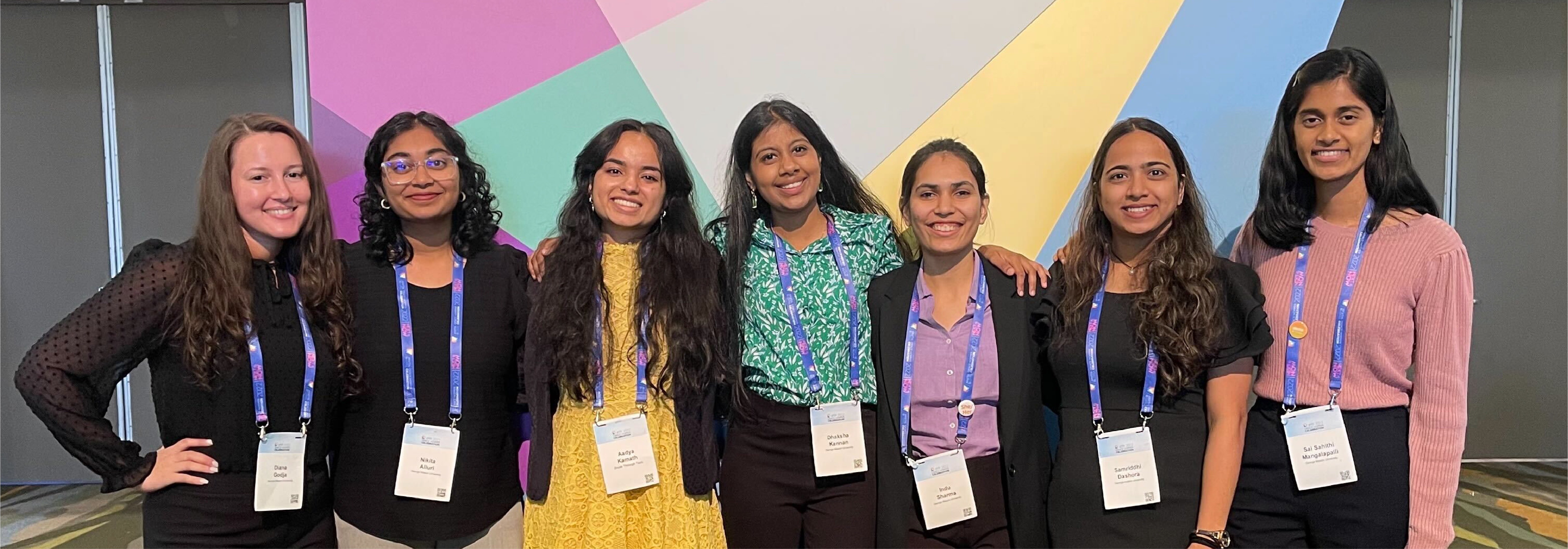 Slide Image: CS Students at the Grace Hopper Celebration 2022, the world's largest conference for women and non-binary technologists.